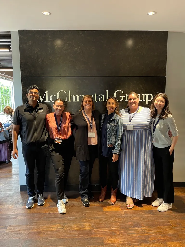 Liz with colleagues at McChrystal Group