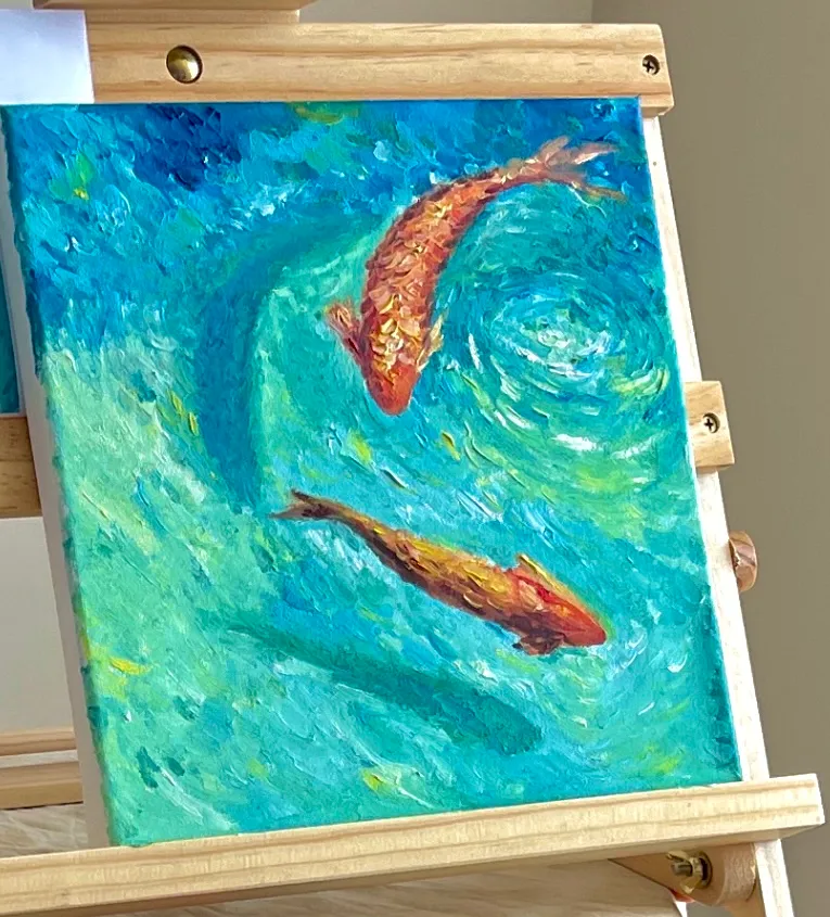 Koi painting by Liz on an easel
